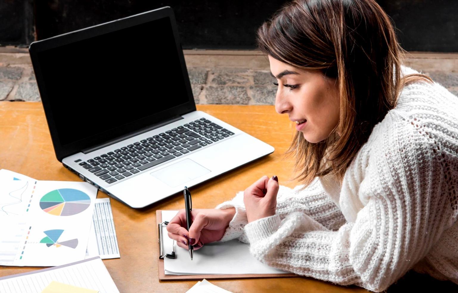 Business meeting discussing financial reports and projections